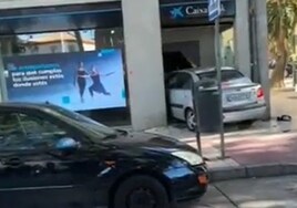 Watch as angry customer rams his car into bank cash machine in Malaga because 'it wouldn't give him money'