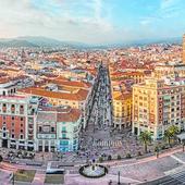 A view of Malaga city centre, with the cathedral, the central Calle Larios and the castle on the hill.