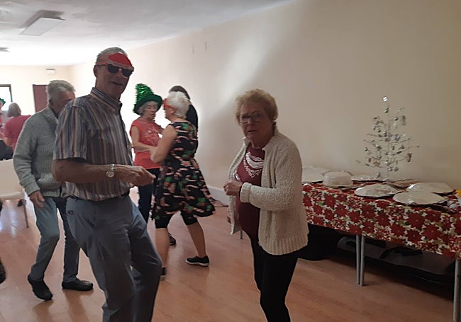 Guests dancing at the Christmas party.