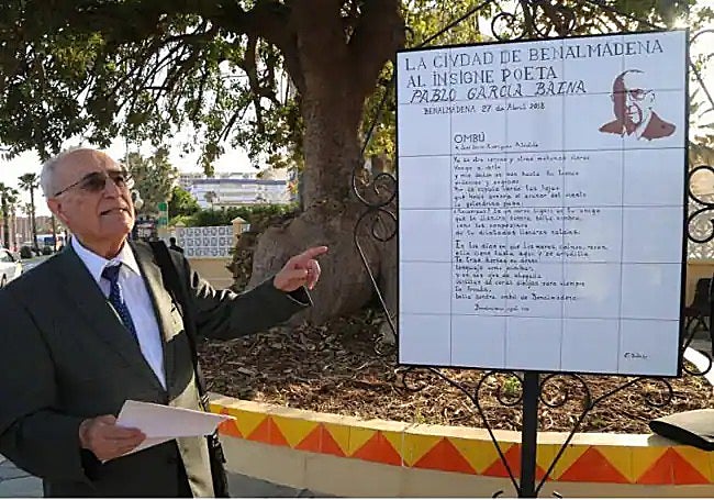 Installation of the plaque with the words of Baena.