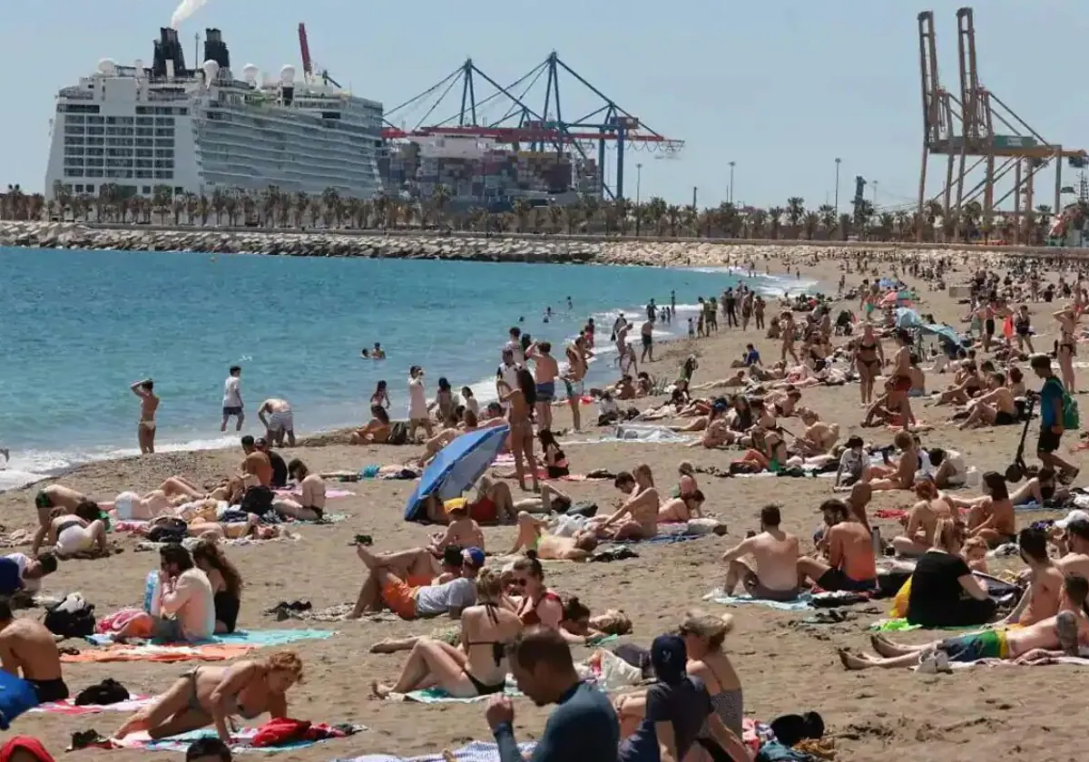 Beachgoers enjoying good weather at La Malagueta beach in Malaga city (file image).