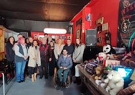 Members of the motorcycle club deliver gifts to the children.