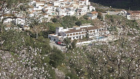 Moclinejo: A two-eyed castle or simply a place