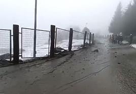 Two hundred people evacuated as a torrent of mud cascades down several ski slopes in Spain's Sierra Nevada