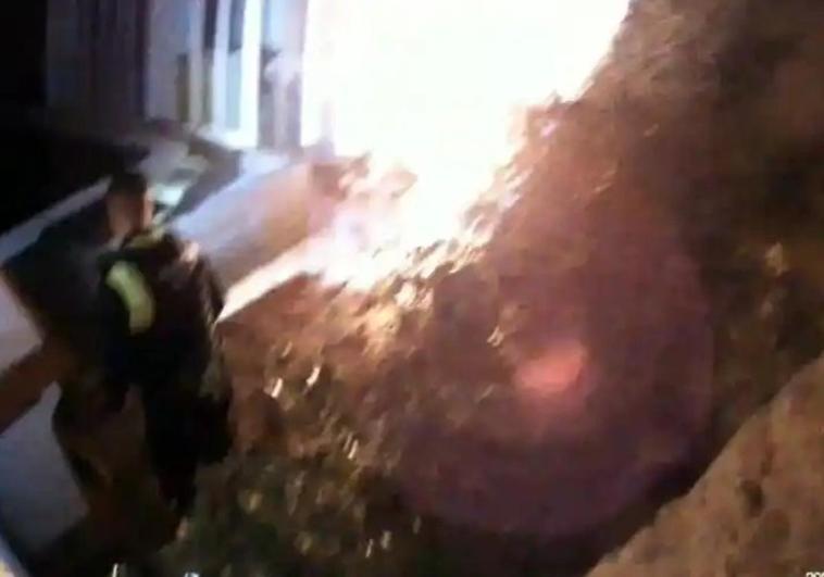 One of the officers in the area where the fire started.