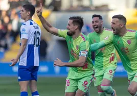 Genaro celebrates giving Malaga the lead.