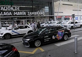 VTC vehicle in the pick-up area of Malaga railway station.