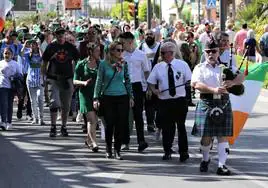 A previous St Patrick’s Day parade on its route from the church in Arroyo de la Miel to the main square.