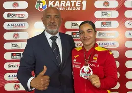 María Torres poses with her medal.