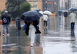 File image of people out in the rain in Malaga.
