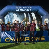 The Hornchurch players celebrate with the ECL trophy.