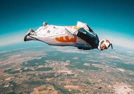 David Tejeiro doing a jump in a wingsuit.