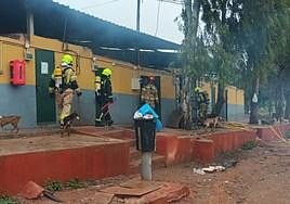 Firefighters at the scene of the blaze.