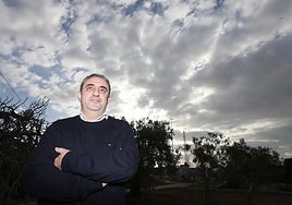Jesús Riesco, director of Aemet's Malaga weather centre, under a cloudy sky.