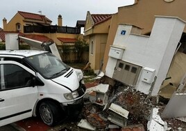 The van crashed into a shared wall, causing it to collapse.