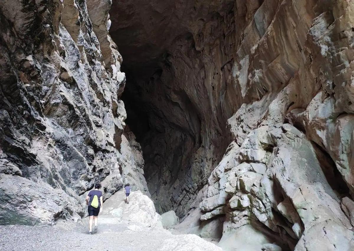 This is the spectacular cave near Ronda with an entrance standing over ...