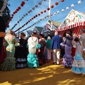 Sevillians turned out in traditional attire to enjoy the first day of the fair.