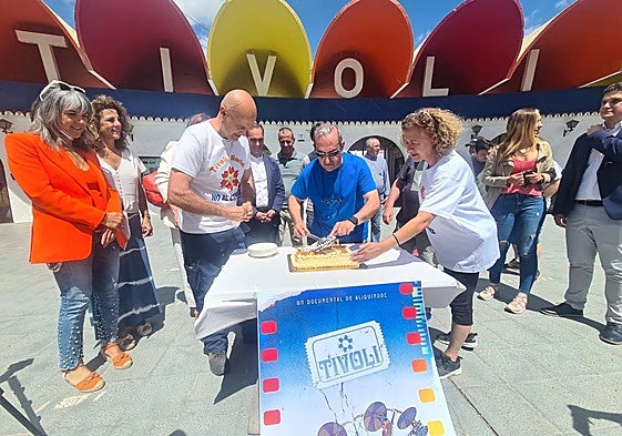 Staff from Tivoli with the birthday cake to mark the 52nd anniversary.