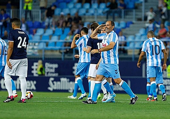 Salva salutes after scoring the equaliser, the last goal of the match.