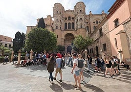 File image of a group of tourists in the area around Malaga Cathedral.