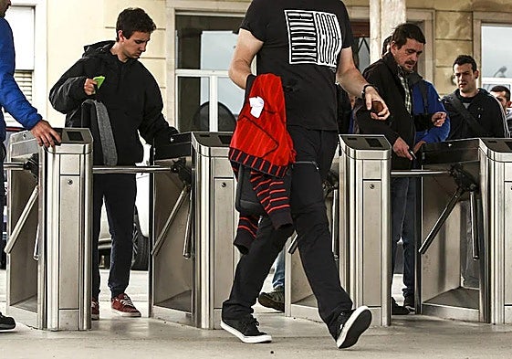 Workers, clocking in.