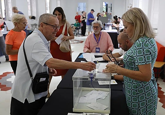 People voting on Sunday at a polling station in Malaga city.