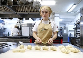 Monica prepares croissants in the kitchen on her training course at IES Jacaranda.