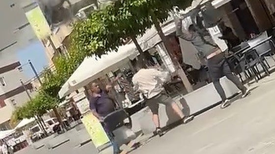 This is the moment two men violently attacked a customer of a bar on the Costa del Sol with a wooden plank, tables and chairs