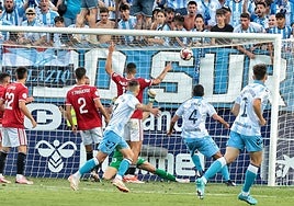 Roberto's powerful header gave Malaga a half-time lead.