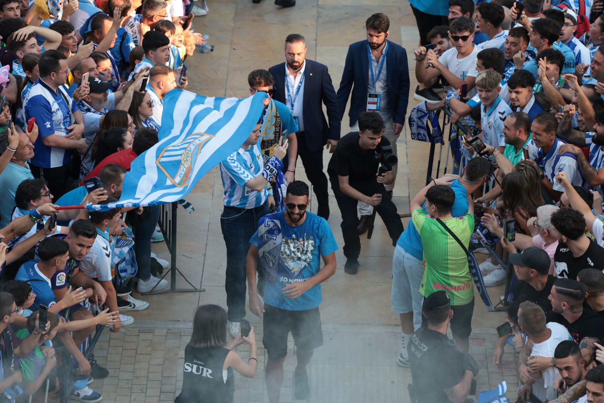 Fans celebrate Malaga CF's promotion as squad take open-top bus tour, in images