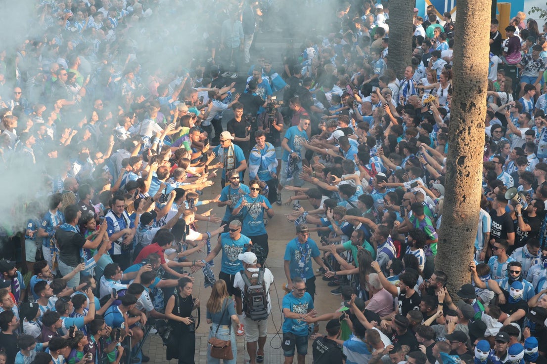 Fans celebrate Malaga CF's promotion as squad take open-top bus tour, in images
