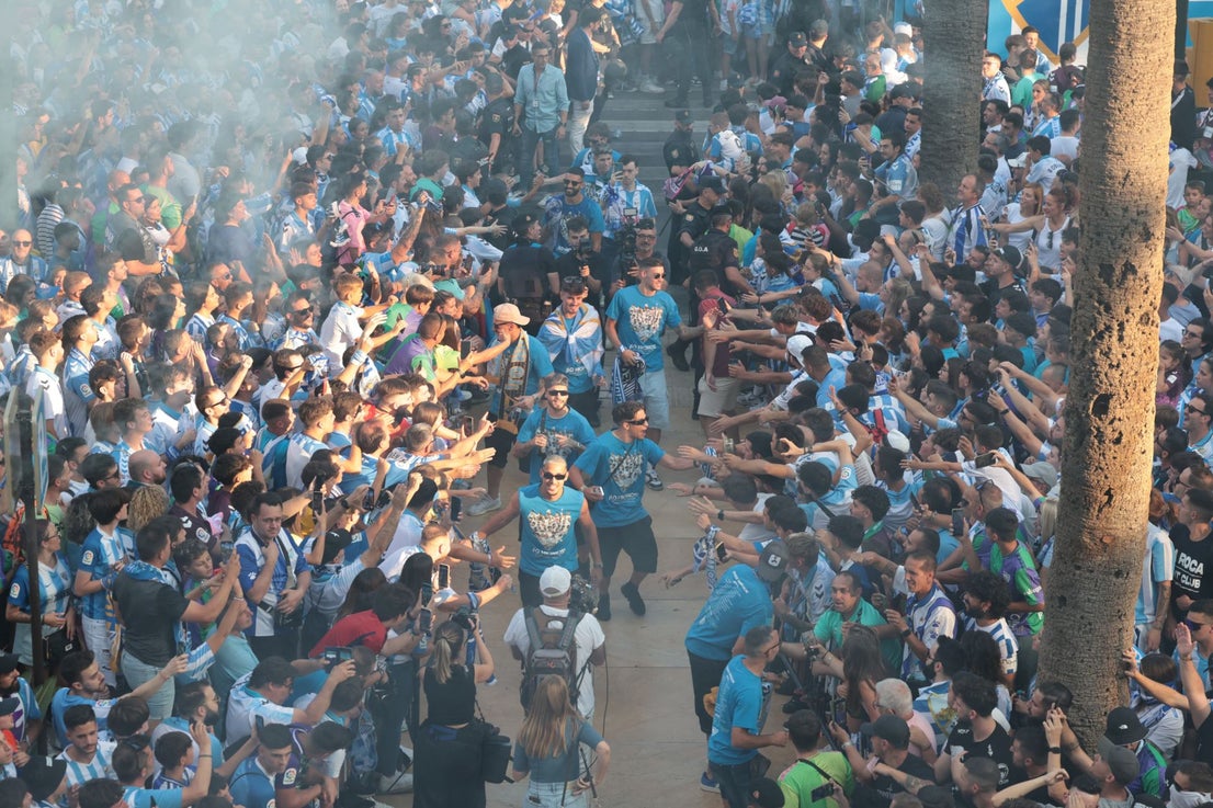 Fans celebrate Malaga CF's promotion as squad take open-top bus tour, in images