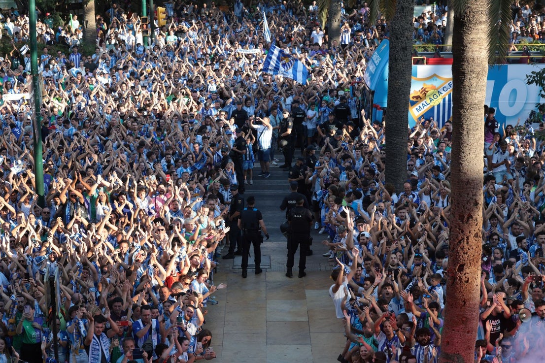 Fans celebrate Malaga CF's promotion as squad take open-top bus tour, in images
