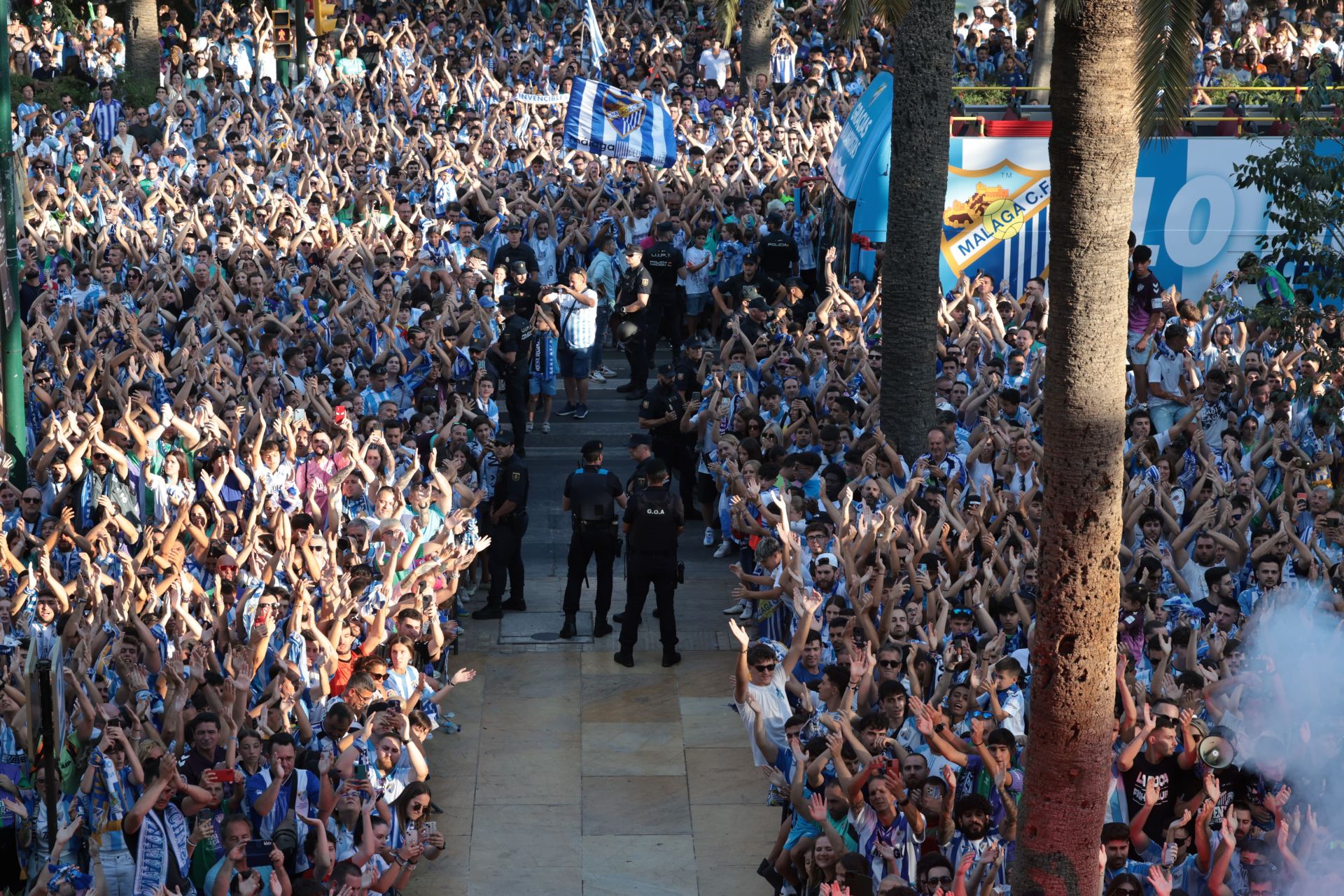 Fans celebrate Malaga CF's promotion as squad take open-top bus tour, in images