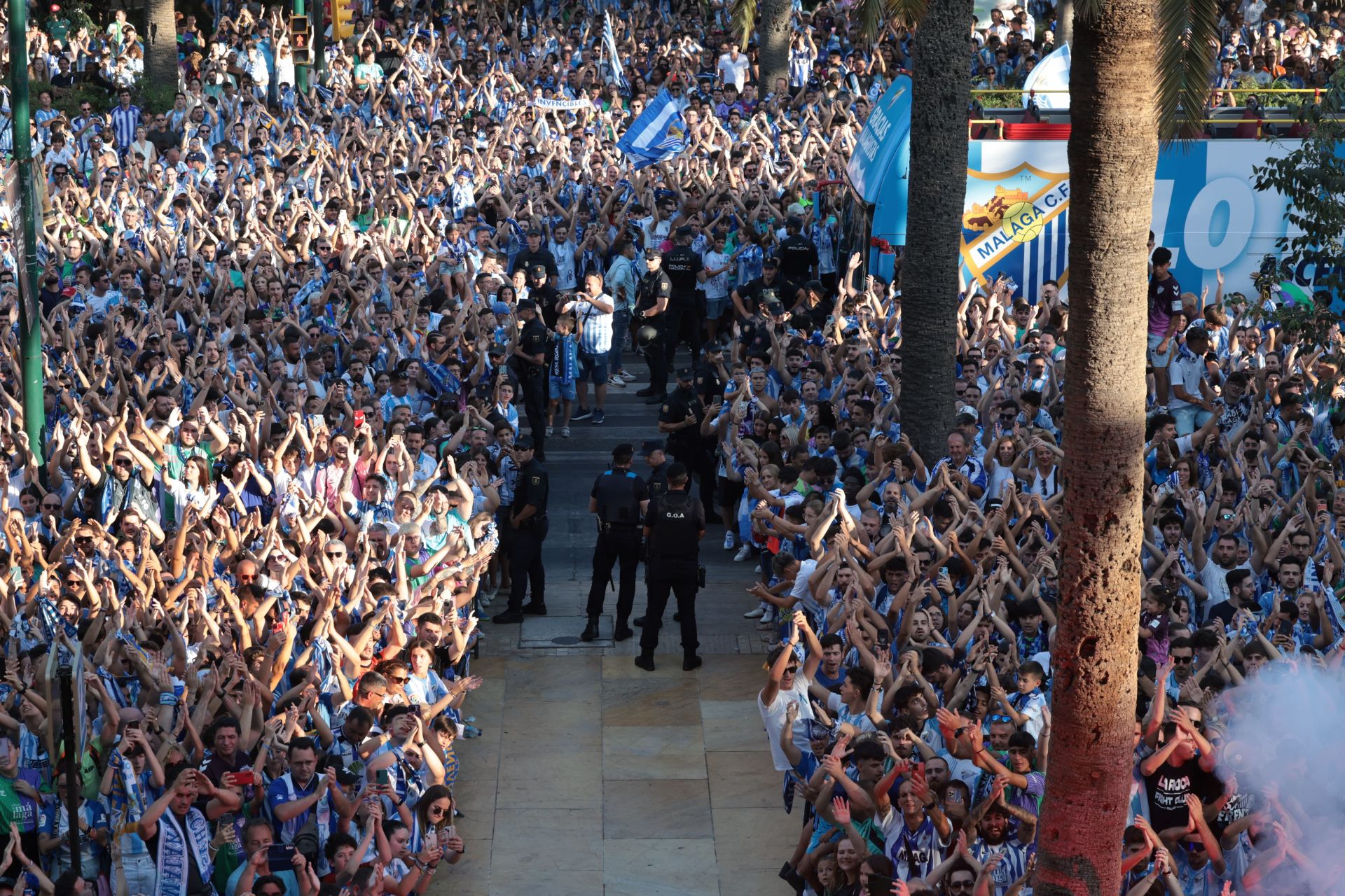 Fans celebrate Malaga CF's promotion as squad take open-top bus tour, in images