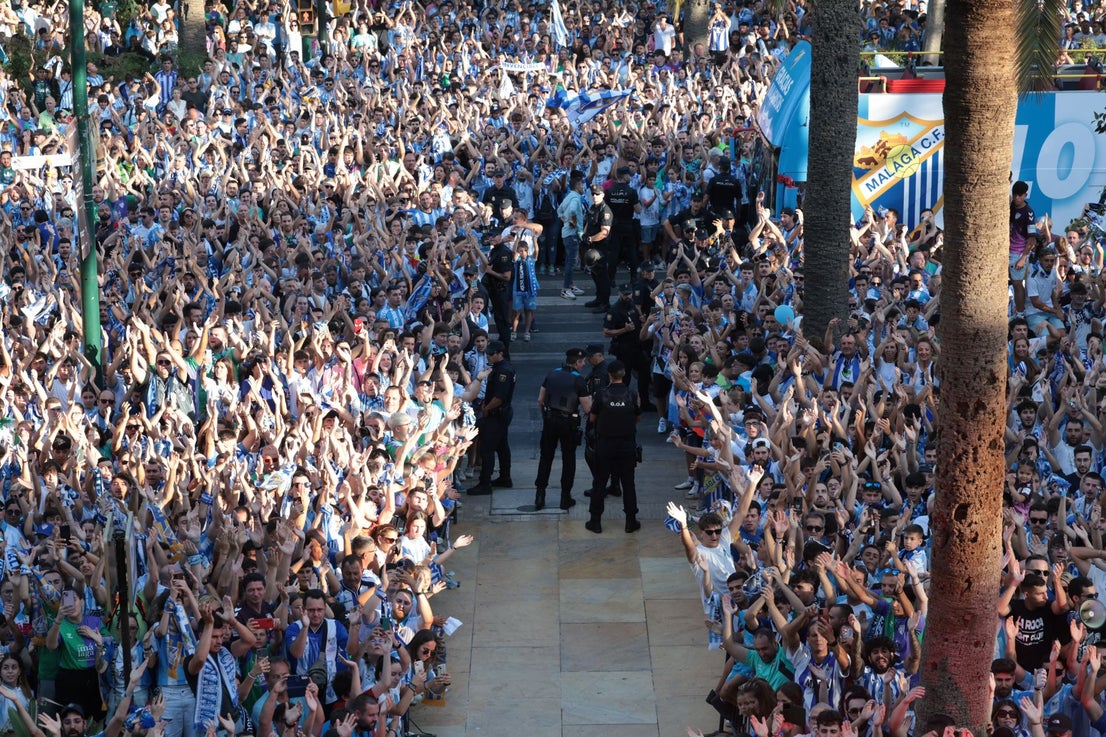 Fans celebrate Malaga CF's promotion as squad take open-top bus tour, in images