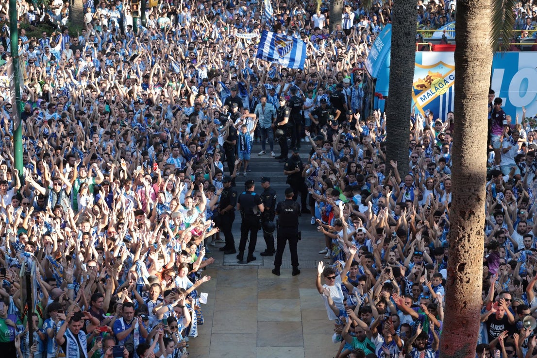 Fans celebrate Malaga CF's promotion as squad take open-top bus tour, in images