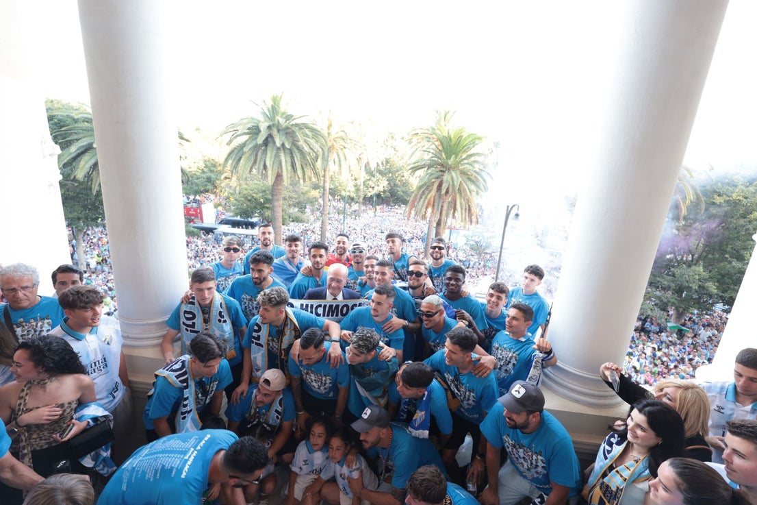Fans celebrate Malaga CF's promotion as squad take open-top bus tour, in images