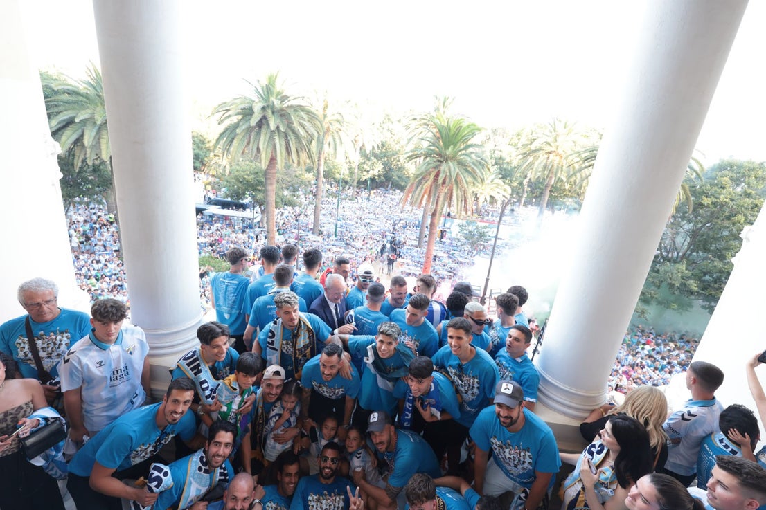 Fans celebrate Malaga CF's promotion as squad take open-top bus tour, in images