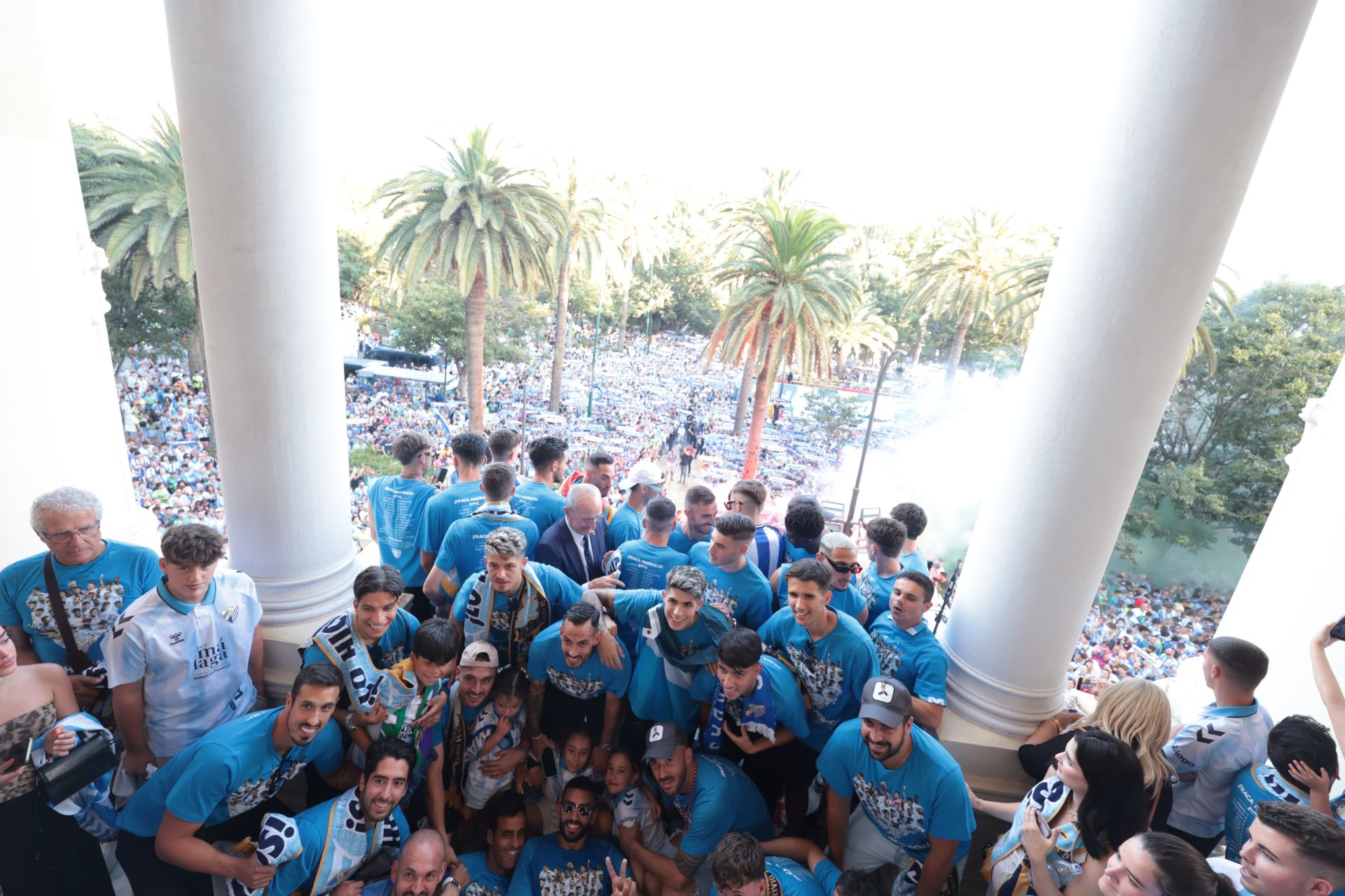Fans celebrate Malaga CF's promotion as squad take open-top bus tour, in images