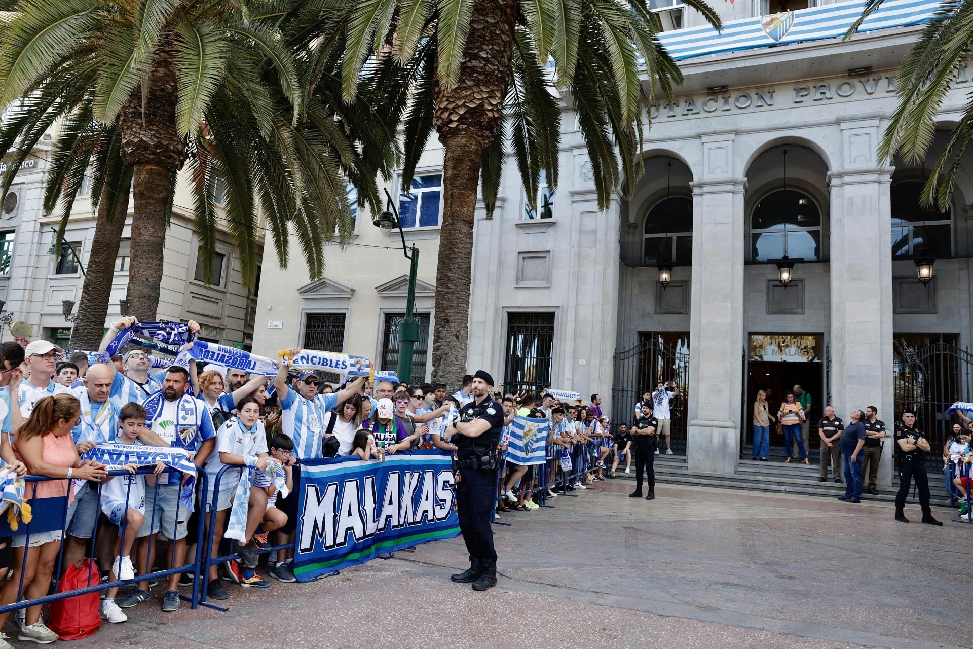 Fans celebrate Malaga CF's promotion as squad take open-top bus tour, in images