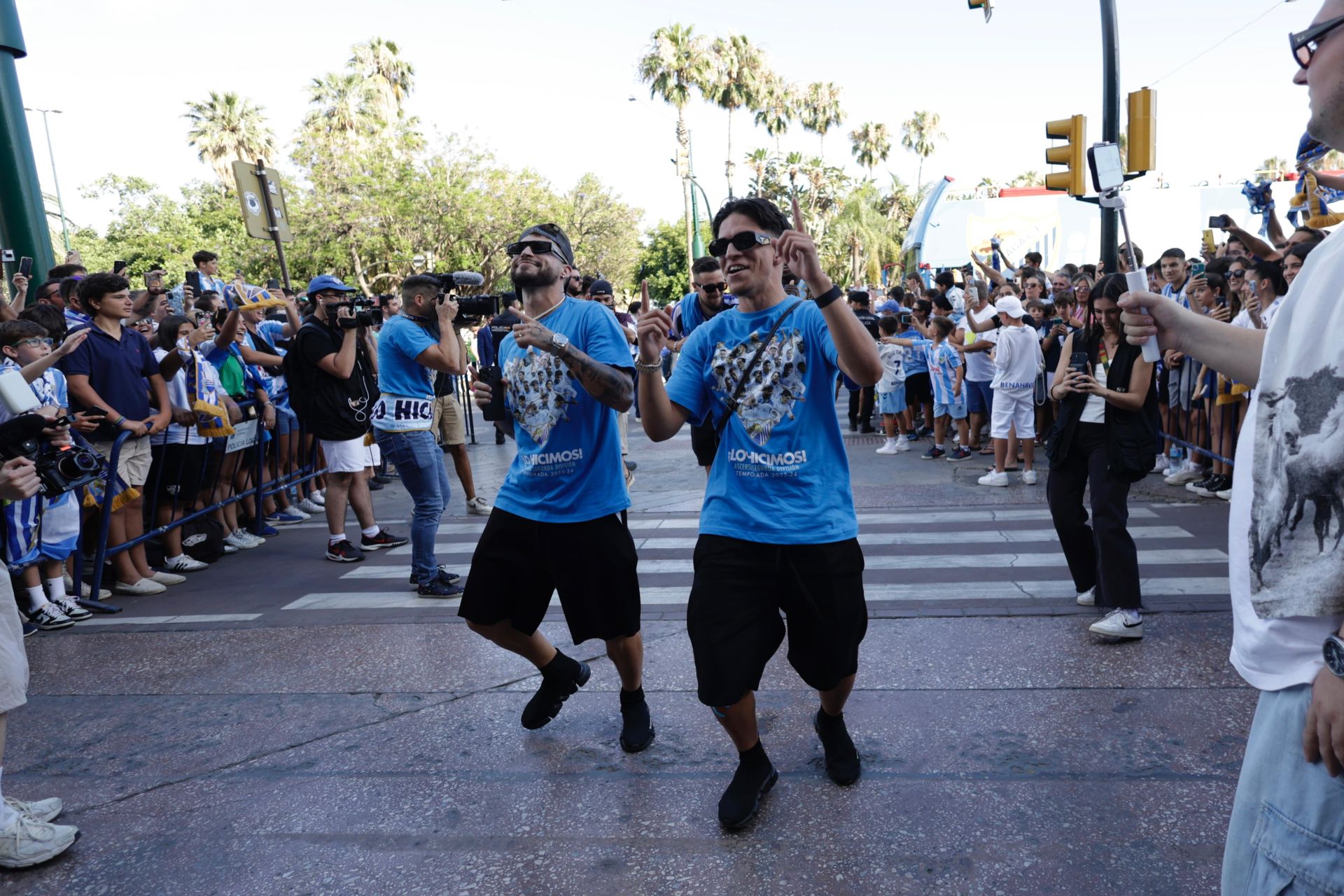 Fans celebrate Malaga CF's promotion as squad take open-top bus tour, in images