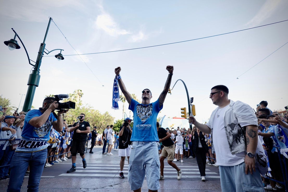 Fans celebrate Malaga CF's promotion as squad take open-top bus tour, in images