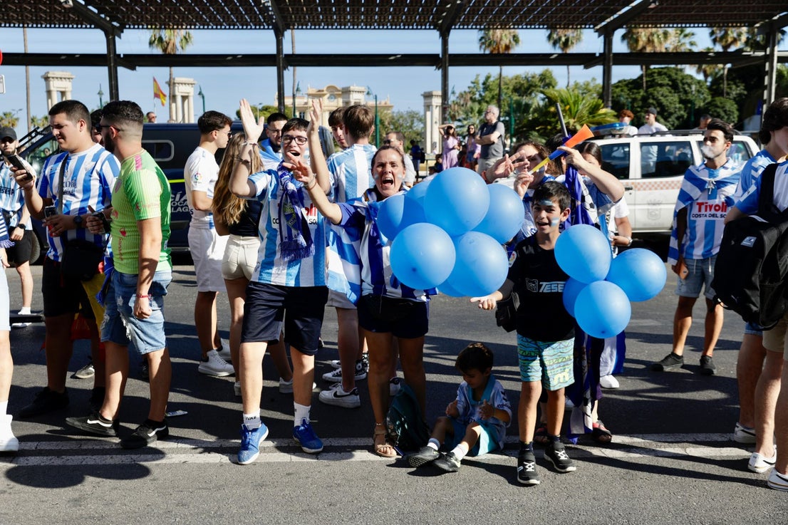 Fans celebrate Malaga CF's promotion as squad take open-top bus tour, in images
