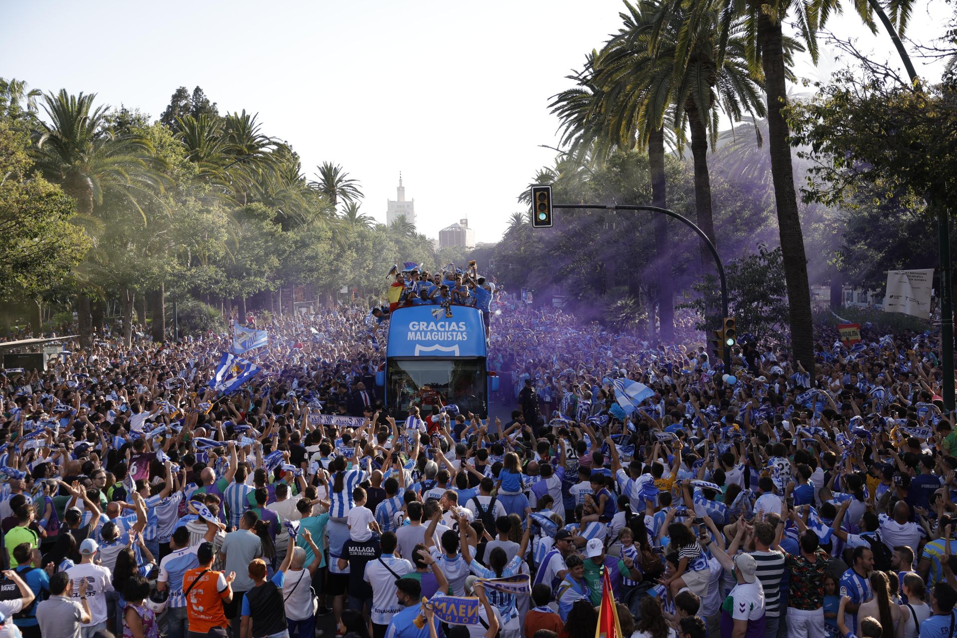 Fans celebrate Malaga CF's promotion as squad take open-top bus tour, in images
