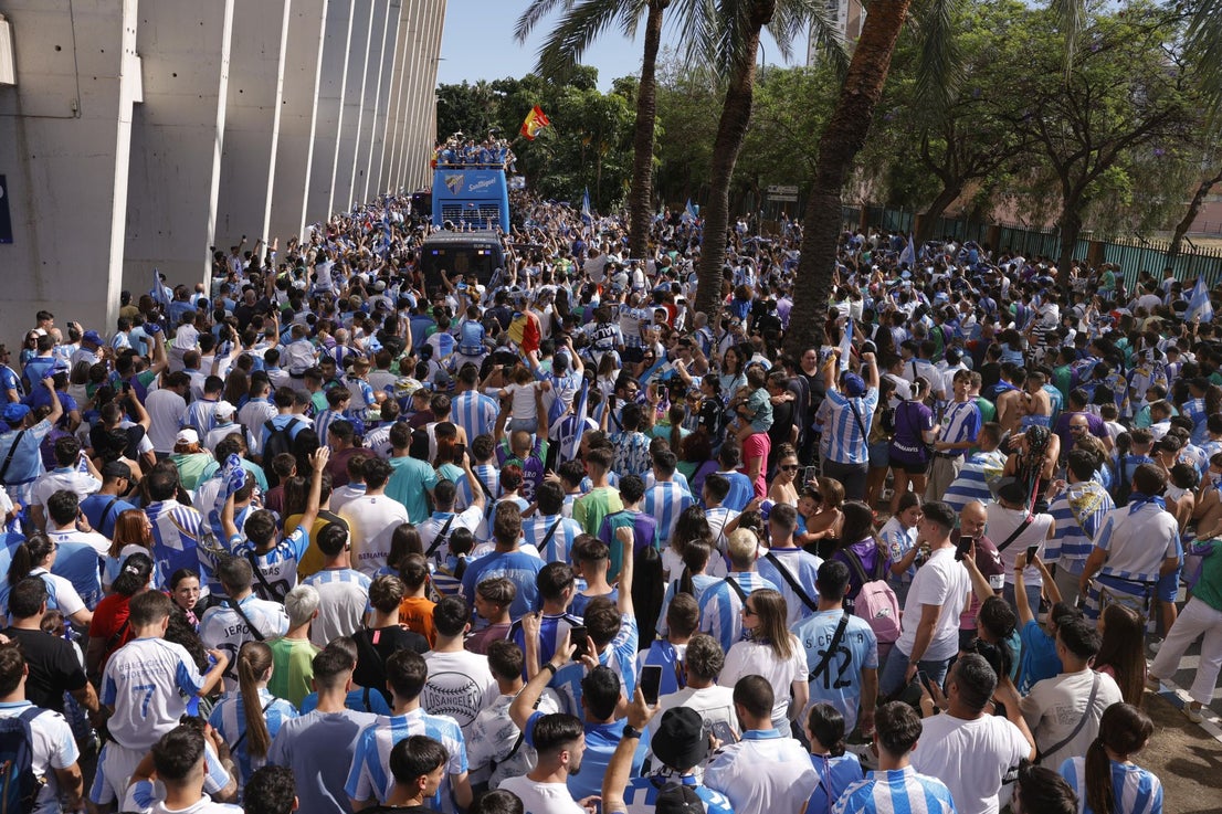 Fans celebrate Malaga CF's promotion as squad take open-top bus tour, in images