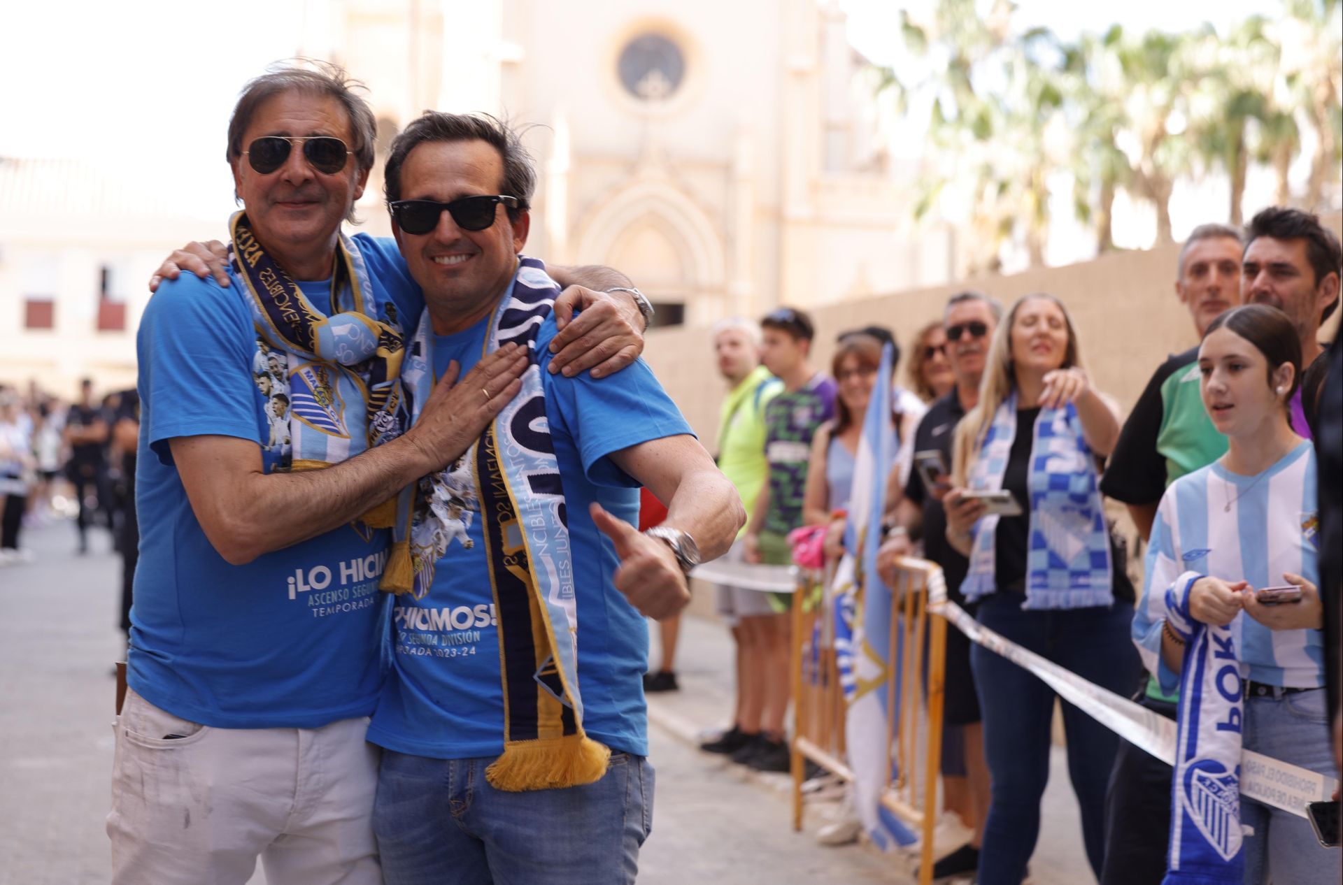 Fans celebrate Malaga CF's promotion as squad take open-top bus tour, in images
