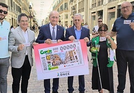 Presentation of the coupon dedicated to Calle Larios in the middle of the famous shopping street itself.
