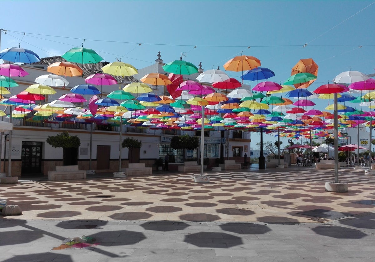 This is when a Costa del Sol town’s iconic colourful umbrellas are set ...