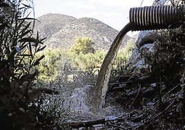 Archive image of a wastewater outlet pipe spilling into the Guadalhorce.